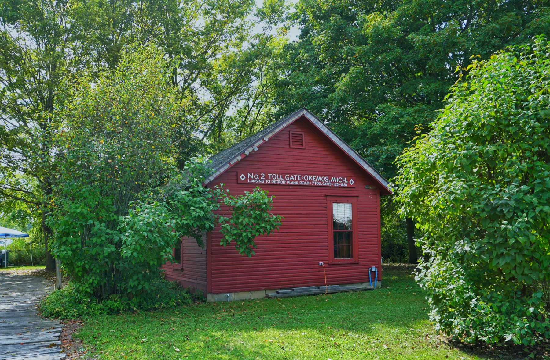 A red historic building at Meridian Historical Village