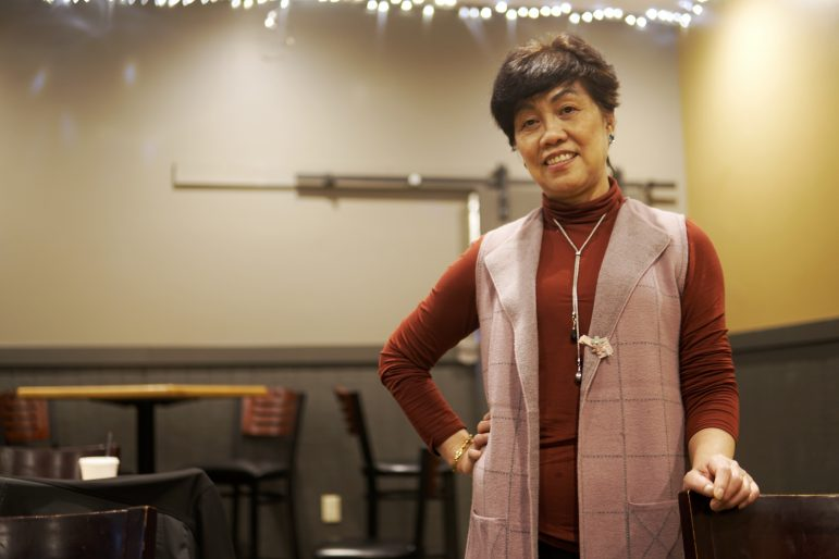 Hsiu Chin Li standing in the back room in Asian Buffet